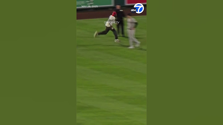 Fan runs onto the field during Angels vs. Yankees game