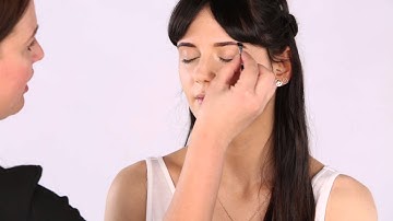 Cassie Lomas gives a demonstration of how to use B. Defined Eyebrow kit