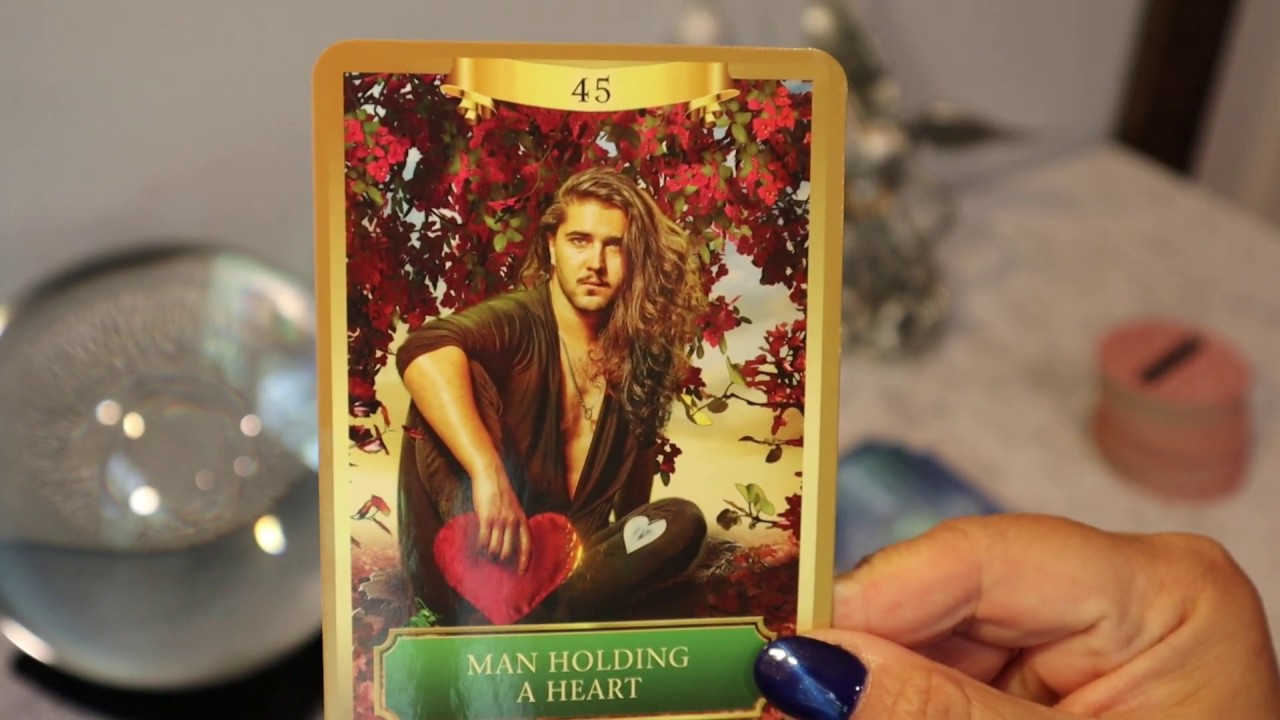 Aries July...Man Holding Heart...Aries Tarot Reading July