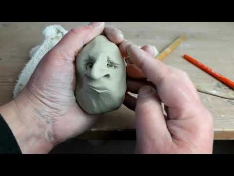 Studio Pottery Technique - Clay puppet head.