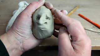 Studio Pottery Technique - Clay puppet head.