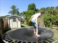 Teddy kicks a water balloon to pieces, slow motion 240 fps, trampoline