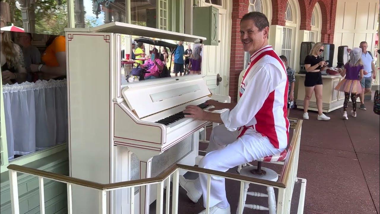 Walt Disney Worlds Pianist Neal at Casey’s Corner playing Happily Ever