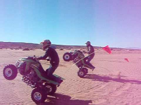 Dvid and Bence Riding Wheelies Side-By-Side