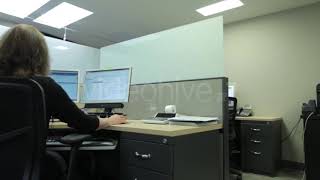 Woman on Computer in Cubicle - Stock Footage from Videohive