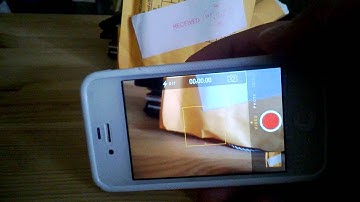 How to switch between rear and front camera on the new iOS 7 on my iphone 4s