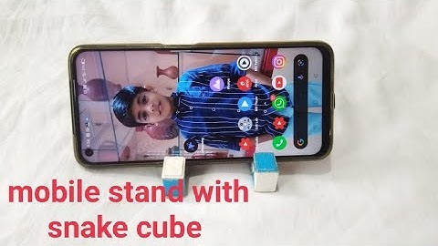 Mobile stand with snake cube