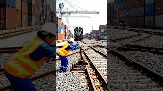 Download Lagu Rail Worker Directing the Train Through the Cargo Terminal MP3