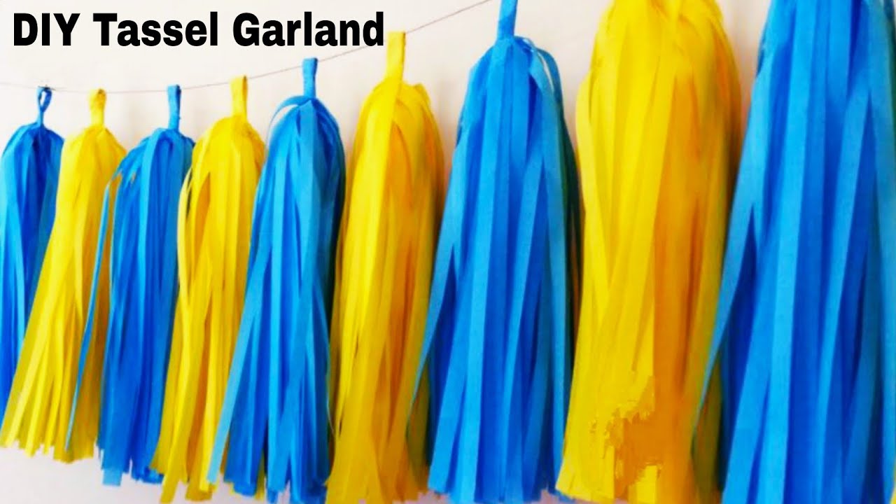 DIY Tutorial: Colorful Tissue Fringe Garland // Hostess with the Mostess®