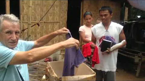 PARALYZED MAN'S FAMILY RECEIVES GIFT ,  BIBLE FROM...