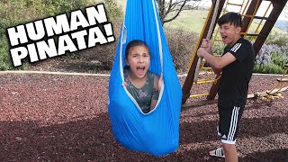 I AM A HUMAN PIÑATA!!! Stuck in a Hanging Cocoon Chair from Walmart!