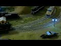 Ho scale roundhouse kit locomotive 2-8-0 running on a 4x8 train layout