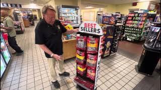 T. M. Shea 18 x 48“ 2-Sided PowerPillar Floor Spinner Display in a Pilot Store