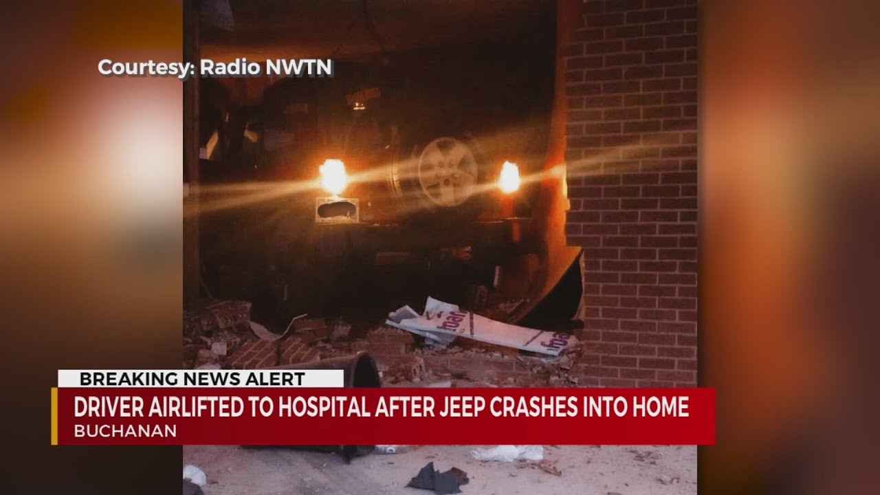 Driver flown to hospital after Jeep crashes into Buchanan home - YouTube