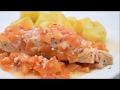 Delicious salmon in foil with tomatoes and baked potatoes