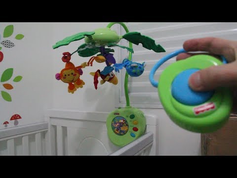 Video: Fisher Price Rainforest Peek-A-Boo lämnar Musical Cot Mobile Review