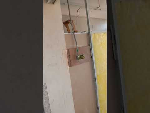 Fixing glass wool in partition