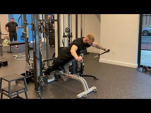 Chest supported prone lying cable cross body lateral raise