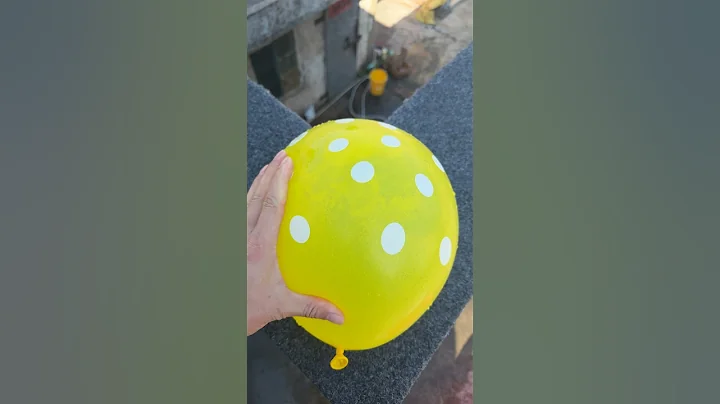 Experiment: Will a water balloon explode if it rolls down a tall building? 💥🎈#shorts