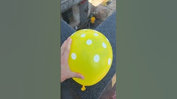 Experiment: Will a water balloon explode if it rolls down a tall building? 💥🎈#shorts