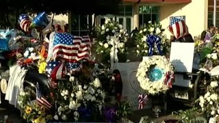 Memorial grows for 5 fallen officers