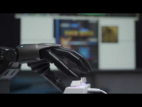 Linkerbot L30 robotic hand playing rhythm game