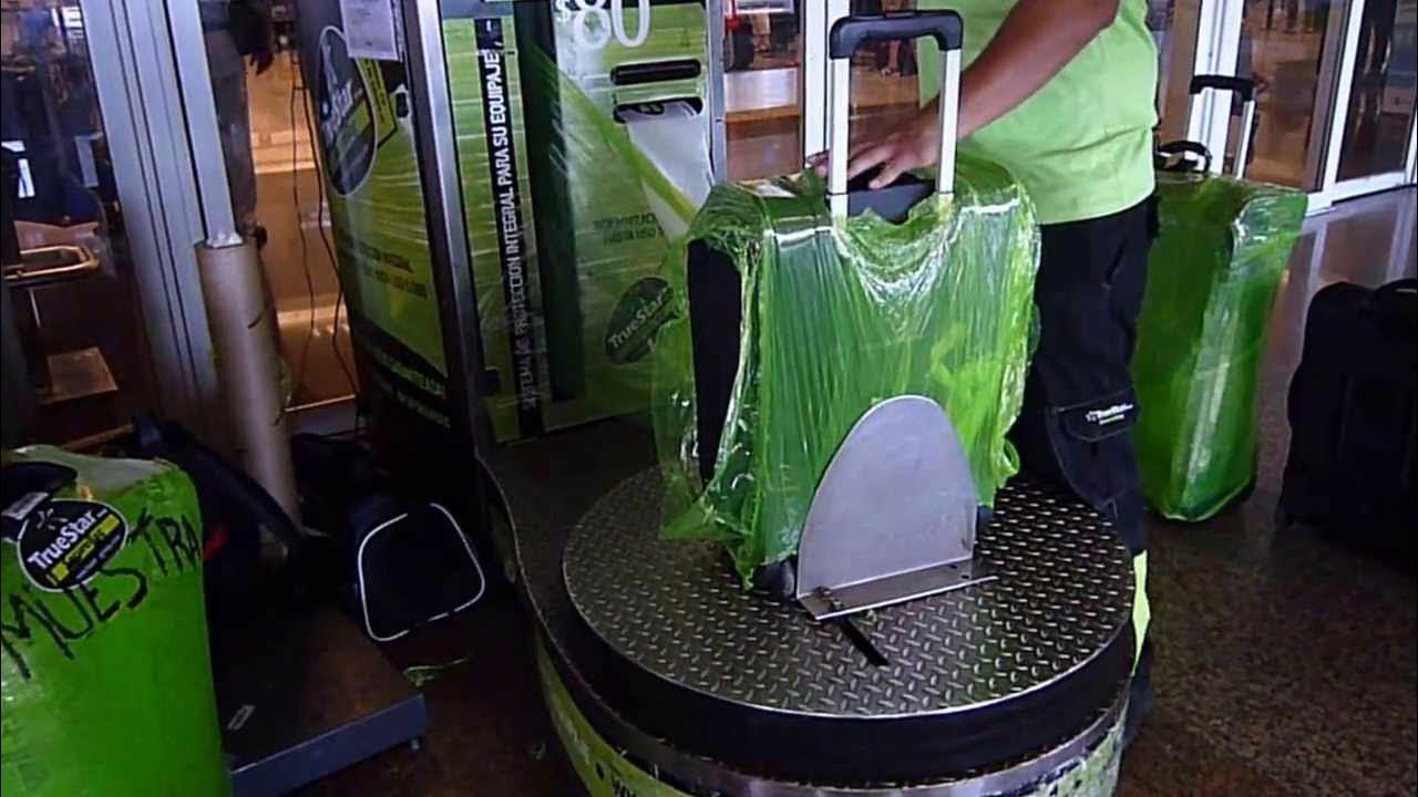 Shrink wrapping luggage in Buenos Aires YouTube