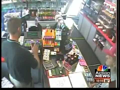 Armed Robber Gets owned by Marine
