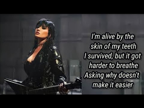 Demi Lovato - SKIN OF MY TEETH (Official Lyric / Letra)