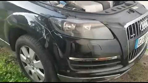 Où se trouve la batterie de ma Audi Q7 ?