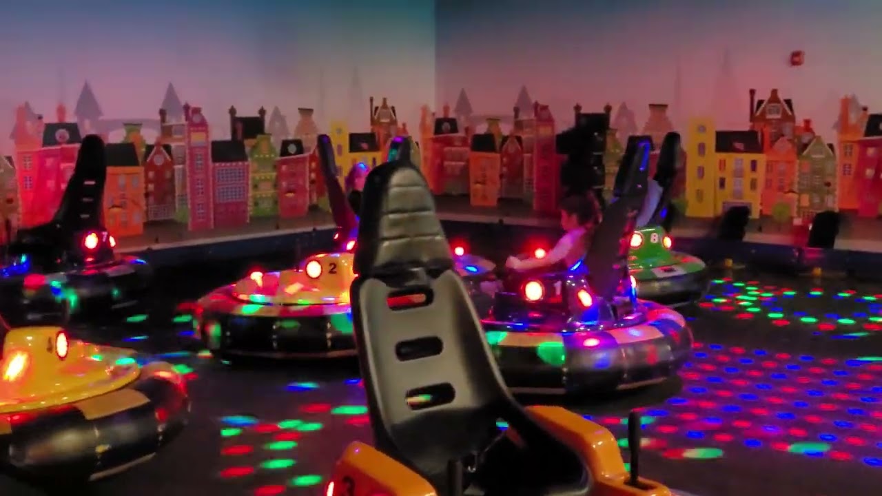 Driving bumper cars at Make Believe Family Fun Center in Parma, Ohio