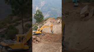 Hyundai and Kobelco Excavator working for hilly road construction #Shorts