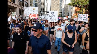 Abortion rights supporters rally in downtown Dallas after Supreme Court overturns Roe v. Wade