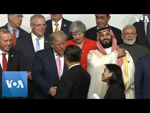 President Trump Shakes Hands With Chinese President Xi At G-20 Family Photo