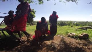 Lighting a fire from friction 20151226 Masai Mara, Kenya