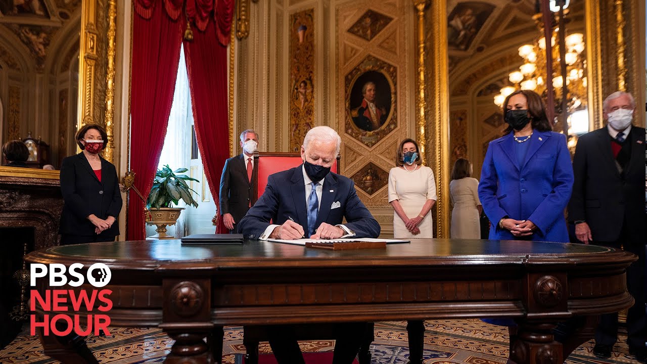 WATCH: Joe Biden signs documents at the Capitol in
