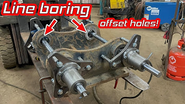 Line boring excavator bracket. Offsetting holes to change pin centres.