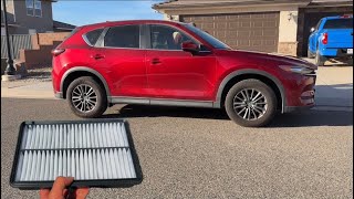 Mazda engine air filter replacement and location shown on CX-5