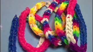 Here's how to make a tripple brasllet with elastics!