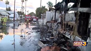 Strong winds spread fire at a mobile home in Palm Desert; Residents, schools evacuated