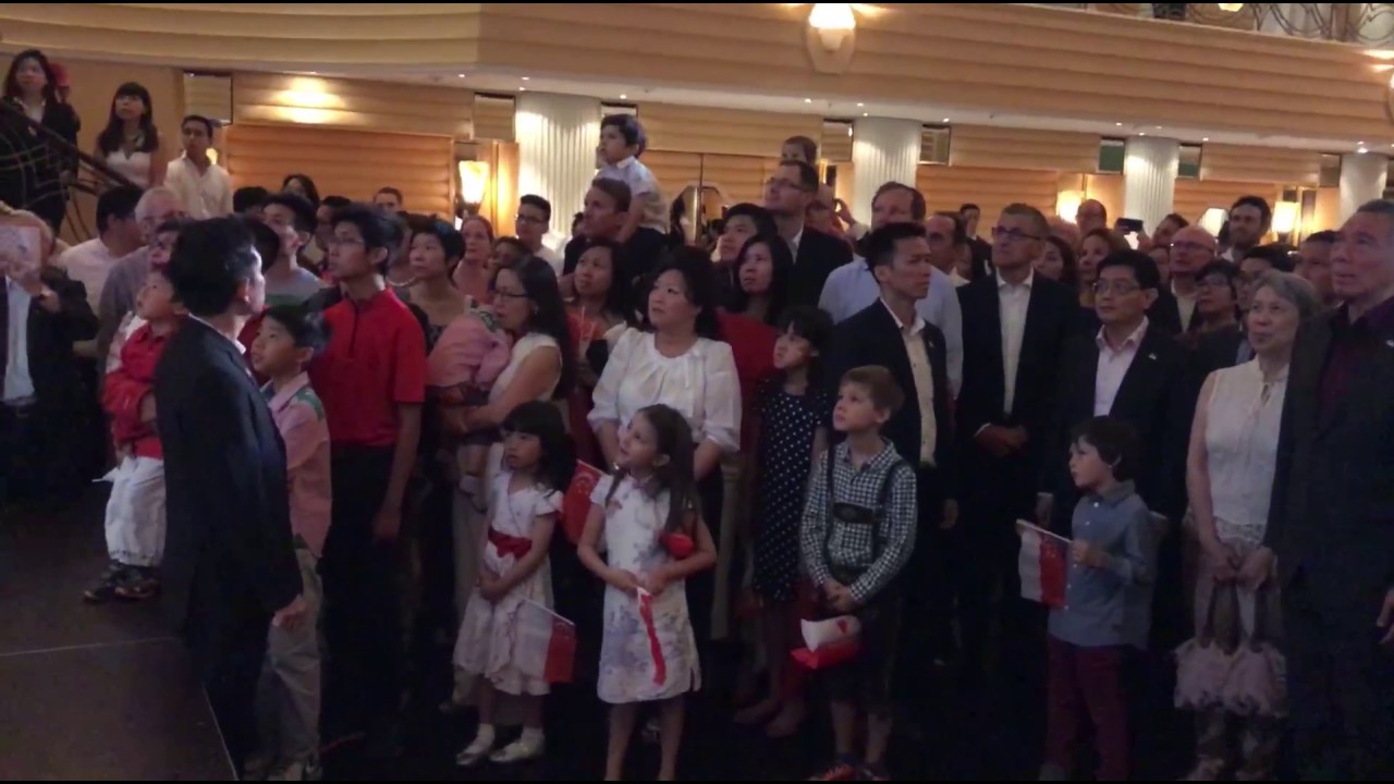 PM Lee singing the national anthem with Singaporeans in Germany