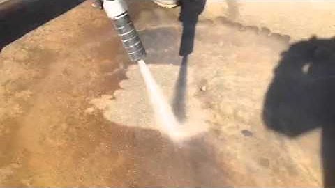 CLEARBLAST 150 - Wet Abrasive Blaster Removing Rust Stains from Concrete