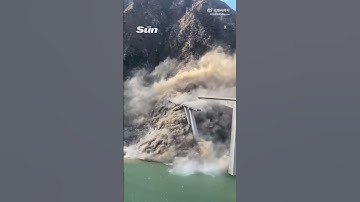 Staggering moment 2,500ft Chinese bridge collapses in cloud of dust just MONTHS after opening