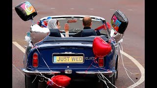 The Duke and Duchess of Cambridge leave Buckingham Palace in an Aston Martin