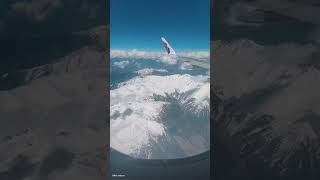 The view is DREAMY.. ☁️✈️#viral #flight #paradise #clouds