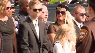 Raw: Bagpipes and procession for fallen officer Michael Langsdorf