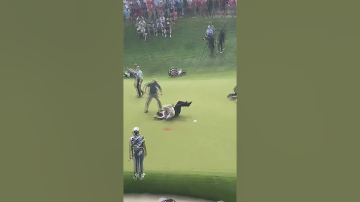 Climate protesters storm 18th green at Travelers Championship