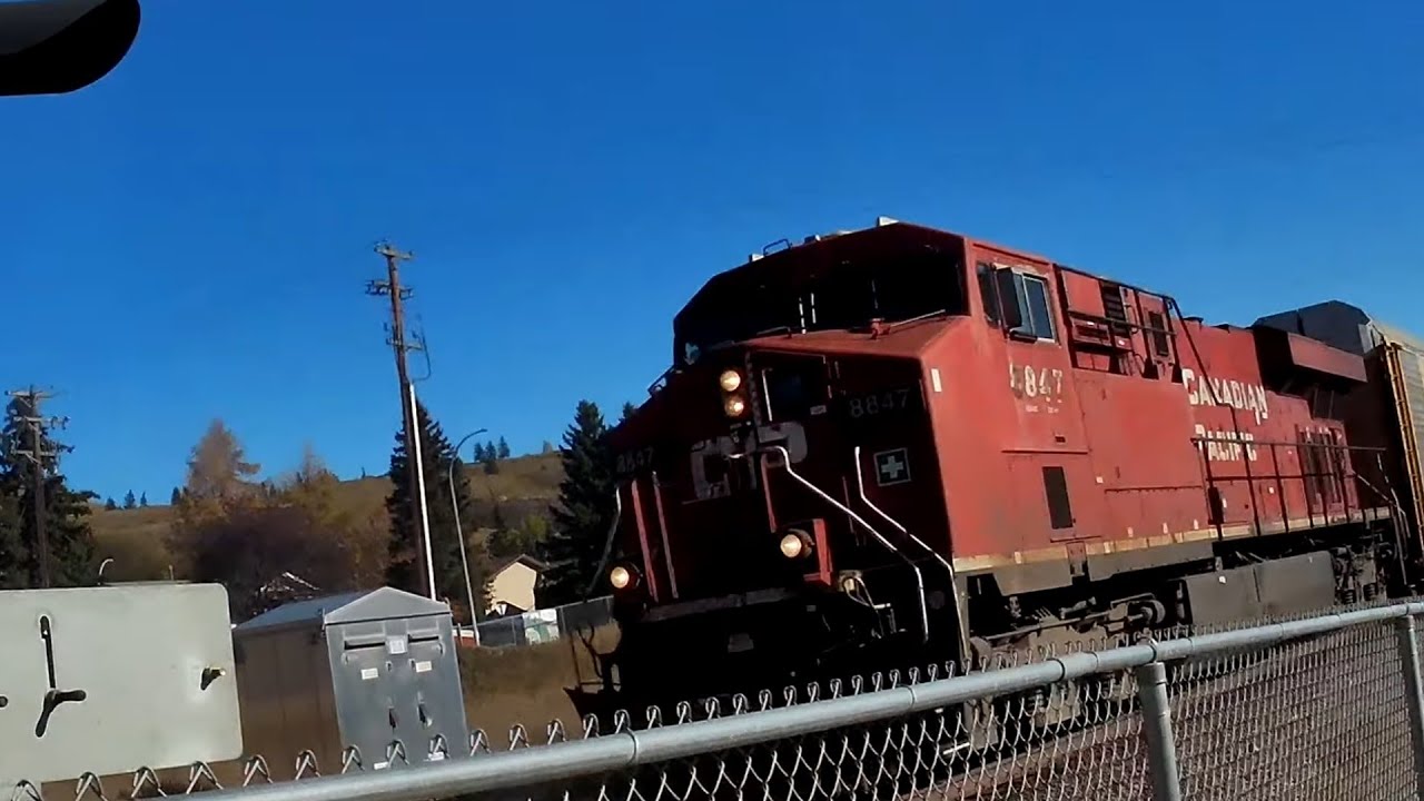 CP(8847) leads a intermodel train through cochrane