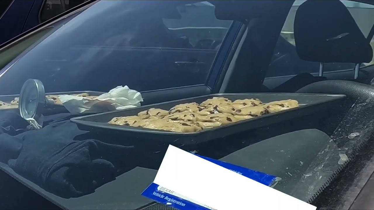 Time lapse of chocolate chip cookies baking on a car dashboard in Texas