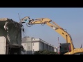 Excavator hydraulic hammer attachment at work